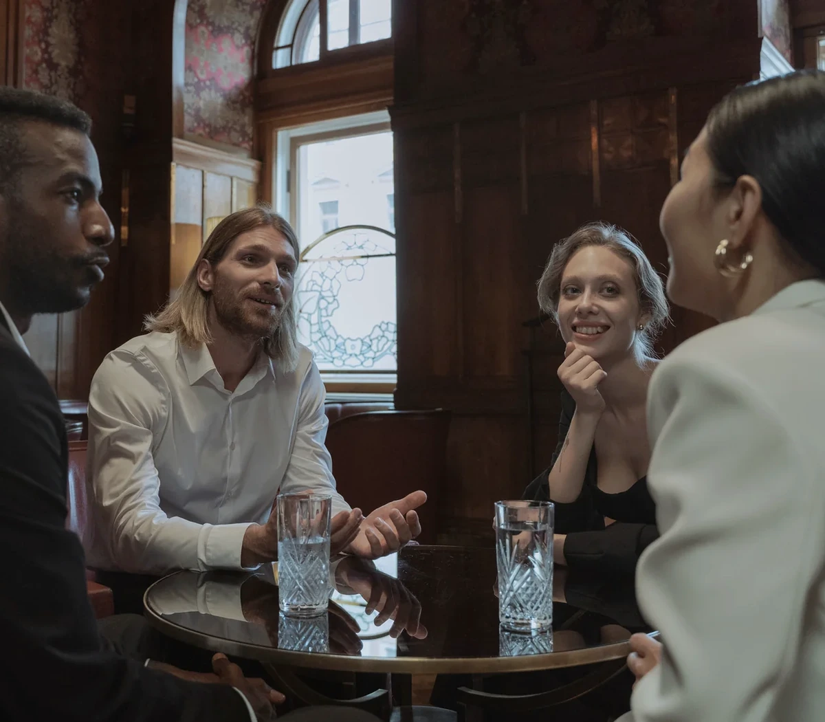 People sharing attentive conversation in community
