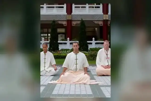 Shaun seated in meditation during a retreat